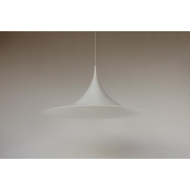 Large vintage pendant light by bondrup & thorup for ikea. made in sweden in the 1980s. white lacquered aluminum with a...