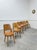 Set of six superb Baumann chairs in beech, light oak stain, made in the 1960s. This is the iconic model with a wraparound...