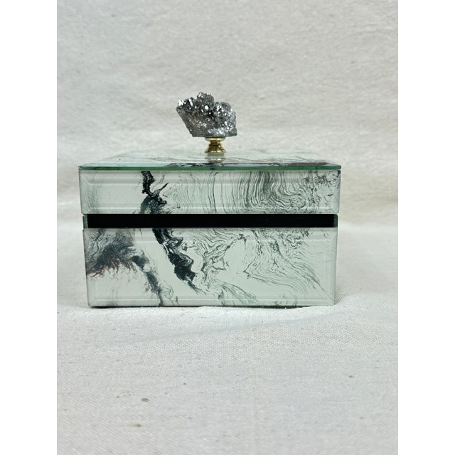 Marbled glass covered jewelry box with pyrite handle. This is a pre-owned item so please see all pictures and ask any...