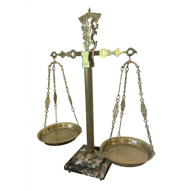 A classic antique scale with polished Portofino marble base with fluted aged-brass stem and etched fittings, hand-made in...