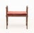 Faux Bamboo Walnut Window Seat, with red velvet upholstered seat. 24.75" H x 24.5" W x 14" D; seat: 14" H. Provenance:...