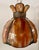This mid-century amber slag glass pendant lamp shade features a beautifully scalloped floral form with richly marbled...