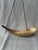 Antique hand made, hollowed cow horn with a woven twisted strap for hanging. Wooden plug on one end, the other a small...