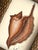 This seashell painting is hand-painted in the warmest, earthy tones — rich caramel browns layered with the softest...