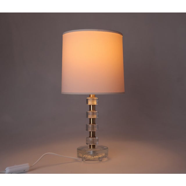 Rare Orrefors crystal table lamp, produced by Vitrika Denmark in the 1960s. Designed by the renowned Swedish designer Carl...