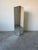 Elegant 1970s vintage pedestal featuring a sleek cube form fully clad in mirrored panels with beveled edges. Its clean,...