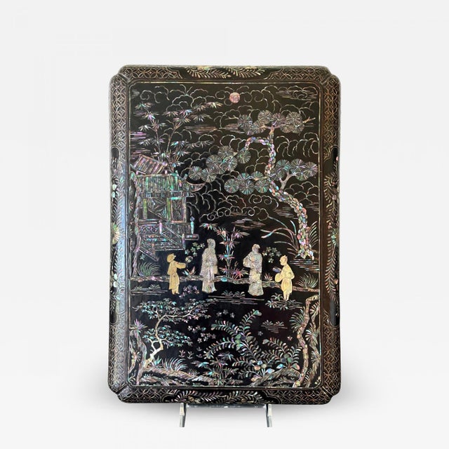 A lacquer presentation box with mother-of-pearl inlays from Japanese Ryukyu Islands circa 17-18th century. The lidded box...