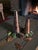 This product is a pair of copper finish metal candle holders in an Arts & Crafts style. The candle holders are designed in...