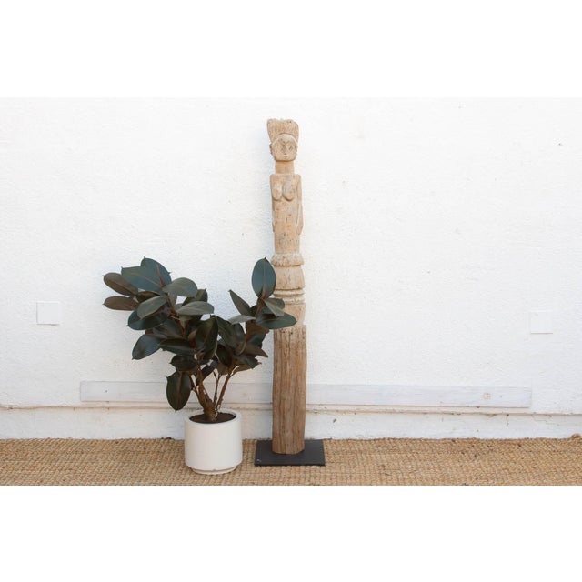 This remarkable 74-inch architectural figure is a sentinel of the Wurkun (Bikwin) people, originating from the rugged...