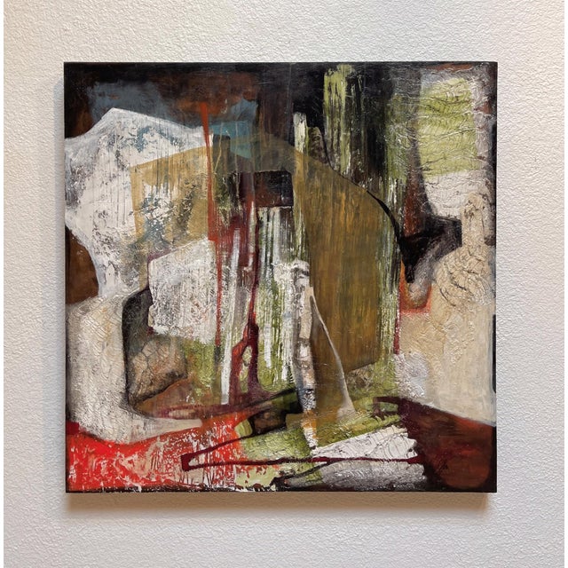 This mixed media artwork presents an abstract cityscape, characterized by tall, geometric forms rendered in muted tones of...