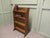 Arts & Crafts Bookcase with Carved Gallery This charming little shelf unit has a carved gallery to the back and 4 open...