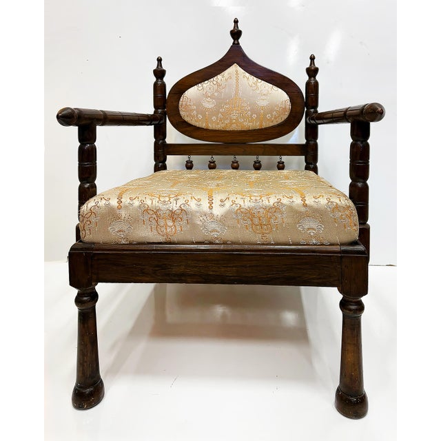 Carved End of Indo-British Colonial Period Lounge Chairs, Pair Vintage pair of mid-20th century chairs from the end of the...
