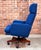 Mid-century modern executive desk chair, in the manner of Fredrik Kayser, featuring vivid cobalt blue upholstery and a...