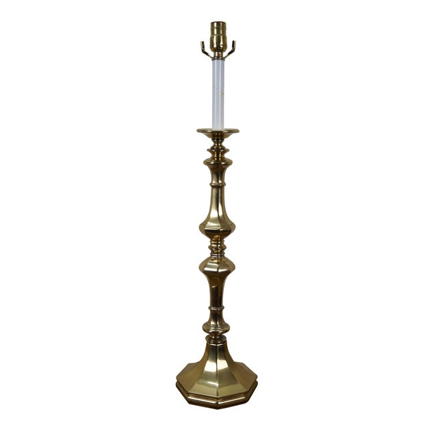 Pair of very large and impressive Rembrandt Lamps Masterpieces Lamps. They feature Hollywood Regency and colonial styling...