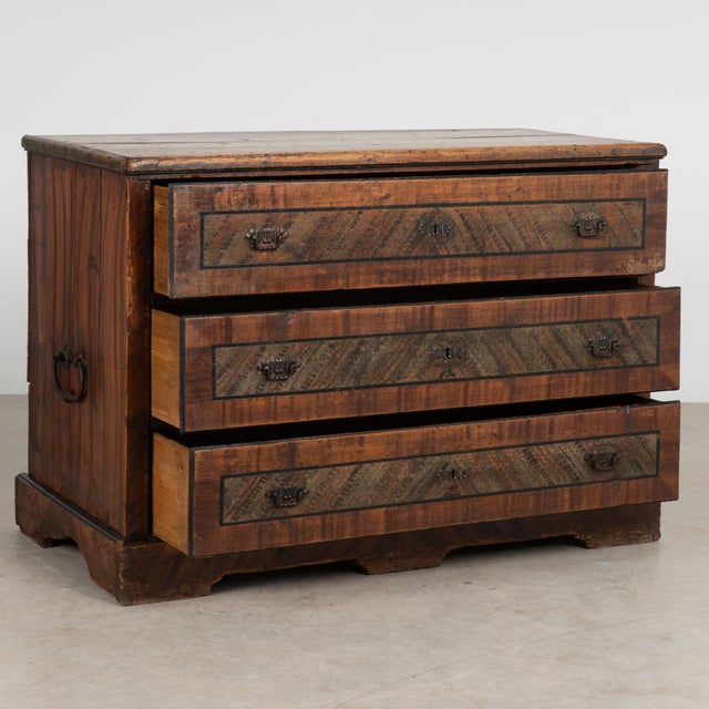 The earth tone colors are all original on this hand-painted antique chest of 3 drawers from Hungary. The lovely hand-...