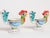 Pair of versatile, hand-painted ceramic compotes/vases/egg cups/vide poches by De Simone (ca. 1970s, Italy). Rooster forms...