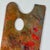 Another addition to our original artists' painting palettes. Original remnant paint of a dominant red color adorn the...