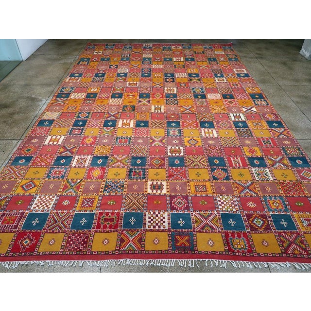 A vintage Moroccan oversize carpet handmade during the 21st century. Measures: 12' 7" x 19' 7"