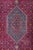 Geometric Bijar Dark Red Rug with Border and Medallion, in Very Good conditions. Designed 1970 to 1979