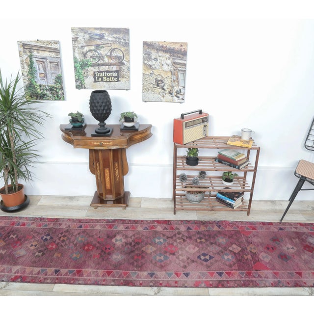 Vintage Turkish Hand-Knotted Herki Runner Rug is a semi-Vintage rug. '60s Eastern region of Turkey's unique rug is...