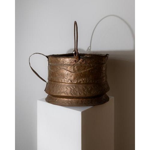 This antique 18th century copper cauldron is a remarkable large hand-hammered vessel with authentic rustic character....
