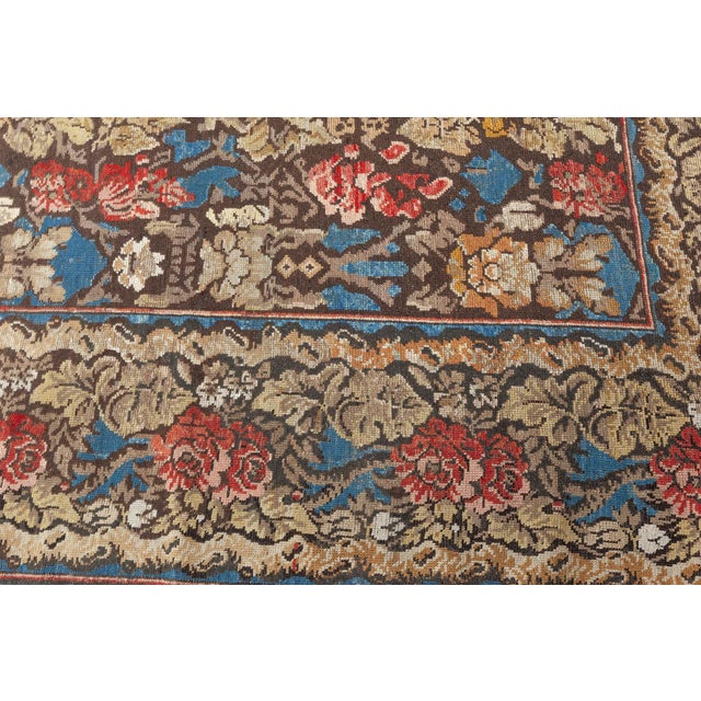 This exquisite antique Ukrainian rug, dating back to circa 1880, is a remarkable example of Eastern European textile...