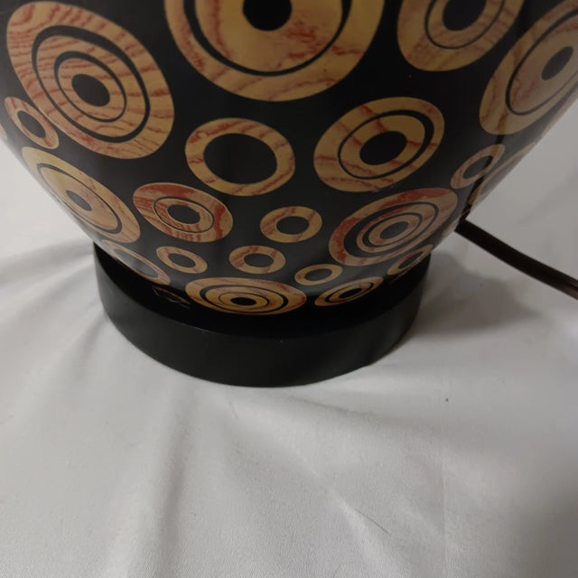 Vintage Mid-Century Modern Wood Lamp With Black Base Color and Embellished With Light Tan Circles With a Touch of Red Grain Lines For Sale - Image 11 of 12