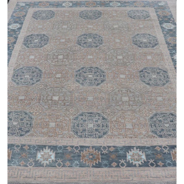 Modern Hand Knotted Khotan in Wool With All-Over Medallion Design in Blue and Earthy Tones For Sale In Atlanta - Image 6 of 13
