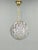Vintage pendant light produced in czechoslovakia during the 1970s. The lamp features a spherical glass shade decorated...