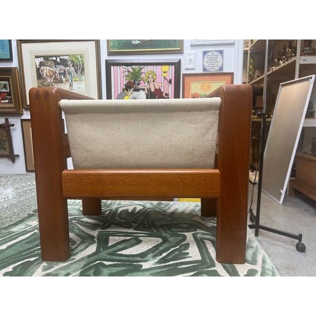 Vintage magazine rack teak, midmodern, scandinavian design, minimalist. Minimalist magazine rack made of teak & linen from...