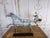 Striking early 20th-century American Folk Art weathervane sculpture depicting a trotting horse pulling a racing sulky with...