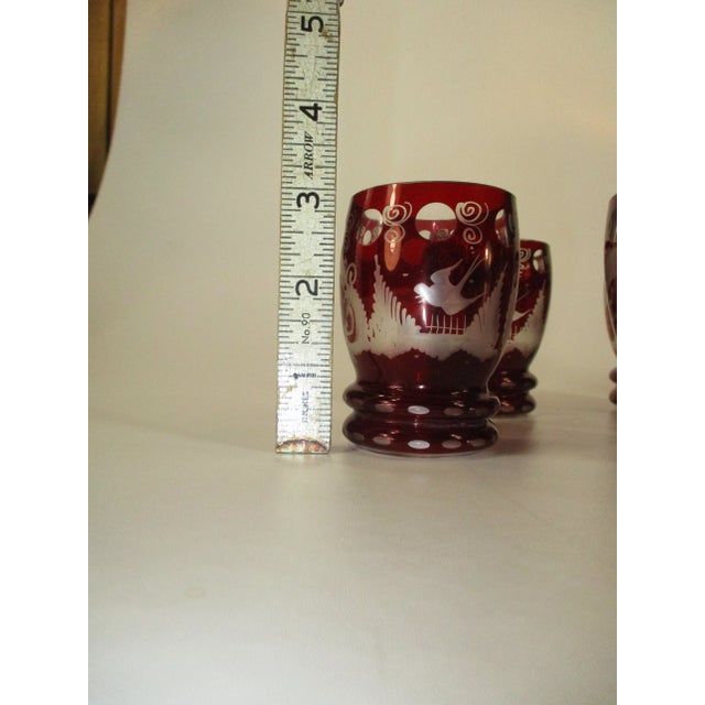 Early 20th Century Bohemian Decanter 6 Liquor Tumblers Red Glass Hand Wheel Engraved Czech For Sale - Image 6 of 11