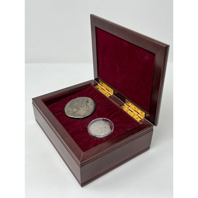 This museum-quality Silver 8 Reale Coin was found by Mel Fisher at the Atocha Shipwreck. It is certified and signed by...