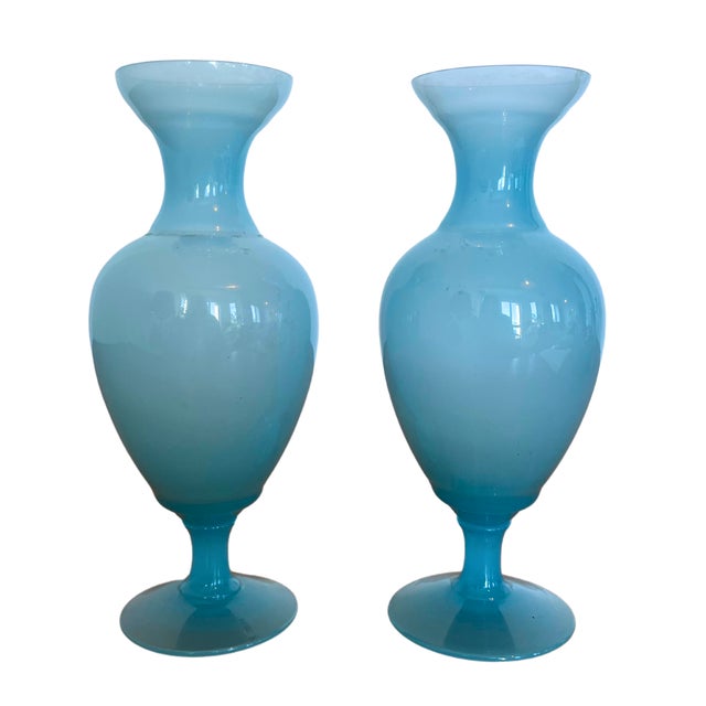 An elegant pair of French Art Deco opaline glass vases in a delicate light turquoise hue. These elegant hand-blown pieces...