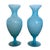 An elegant pair of French Art Deco opaline glass vases in a delicate light turquoise hue. These elegant hand-blown pieces...
