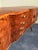 Beautiful Italian mid-century sideboard made of birch wood that gives the sideboard a warm honey color. The sideboard has...