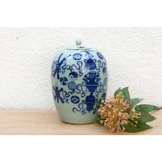 This is more than a jar; it's a visual talisman. This Chinese porcelain jar, likely dating to the 20th century, is a...