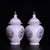 Chinese Pair of Chinese White Glazed Porcelain Jars With Floral Panels & Gilt Finials For Sale - Image 3 of 9