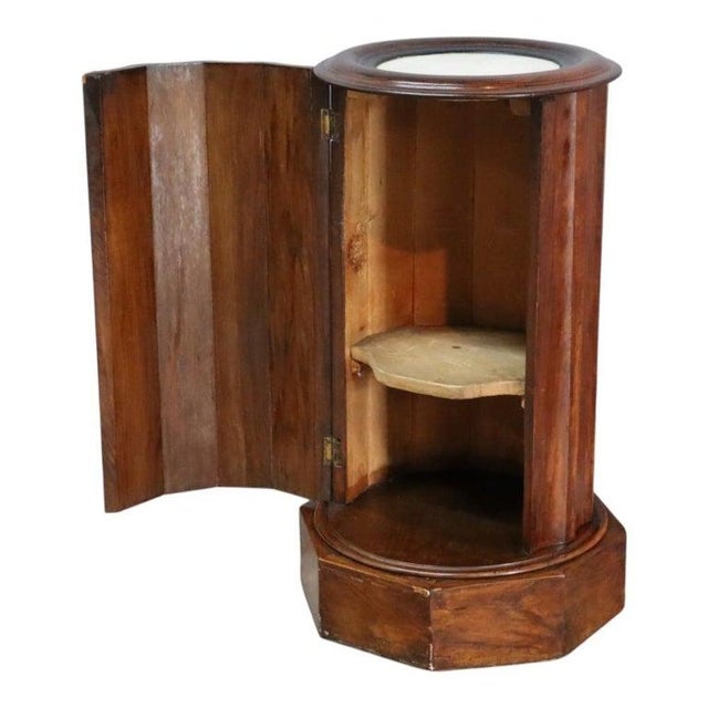 An antique Classical Roman-Greco style mint julep drink stand, crafted from carved rosewood and dating to approximately...