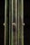 c. 1920s; (likely) Theo A. Kochs Co. - Chicago Antique barber shop coat and hat rack with umbrella drip tray. This piece...