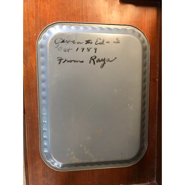 Tin tray with red roses. Measures 12 1/2” x 16 1/4”. There is a signature on the back of when this was gifted Dated...