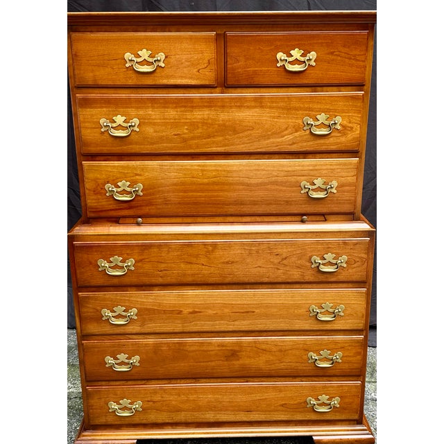 Handsome solid cherry tall chest by Stickley, combining generous storage with a relatively narrow footprint. The classic...
