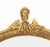 Neoclassical Style Giltwood Framed Oval Mirror, with male bust form crest. Mirror plate: 49.25" H x 38.5" W; frame: 58" H...