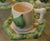 The coffee set consists of 14 pieces: 6 cups, 6 saucers, a sugar bowl, and a creamer. Morrow's work is characterized by a...