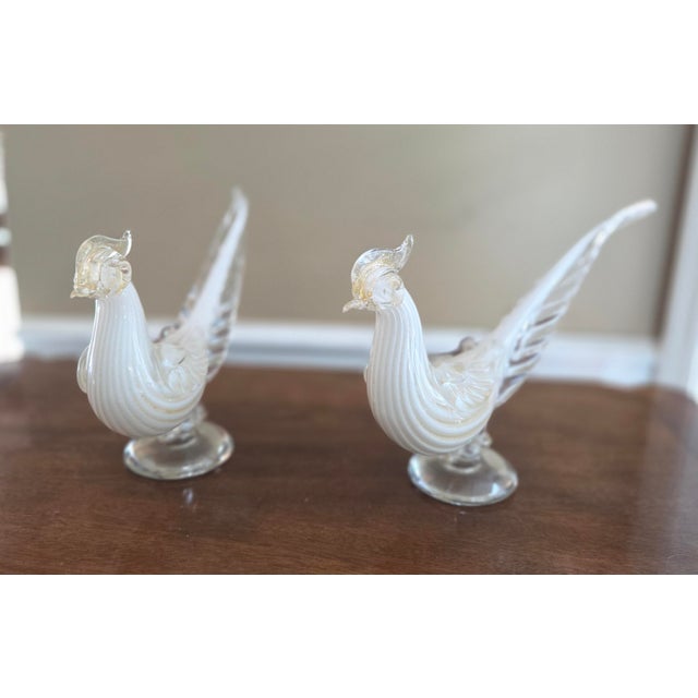 An exquisite pair of mid-century Italian Murano studio art glass pheasant sculptures attributed to the renowned master...