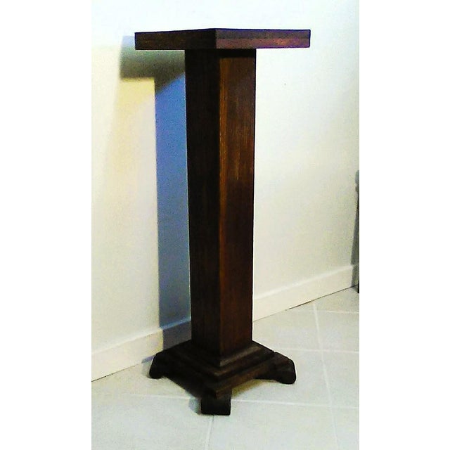 Rare find! A vintage 1900's wood pedestal/plant stand in the Arts & Craft Mission style.. A tall and slender columnar...