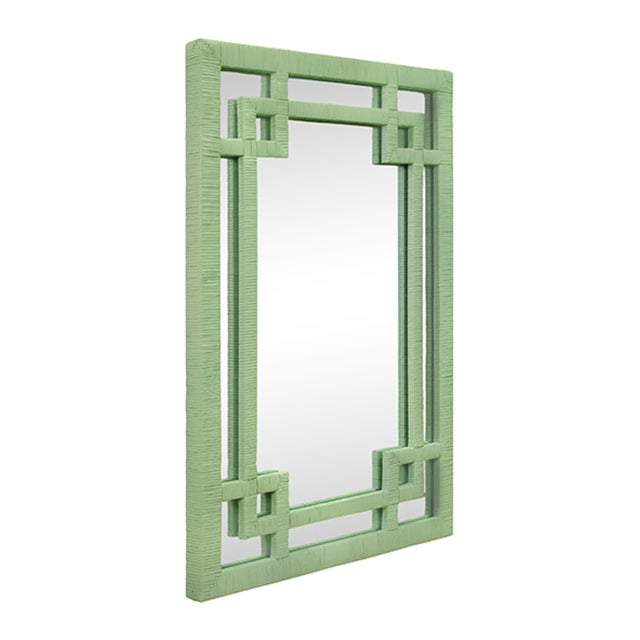 New item. Not vintage. Add a touch of whimsy to your decor with our Geneva Sage Green Rattan Framed Mirror. The unique...