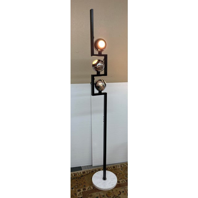 Design Plus Gallery presents a Angelo Lelii's Floor Lamps for Arredoluce. These light fixtures represent the absolute...