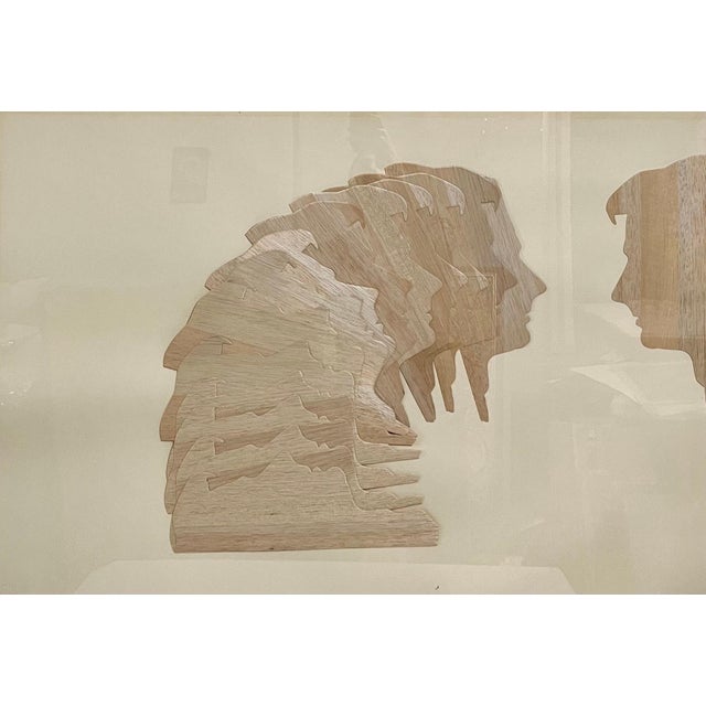 Mario Ceroli (Italian, 1938-) Untitled c. 1970 Wood collage on paper Cut wood attached to paper, depicting multiple...