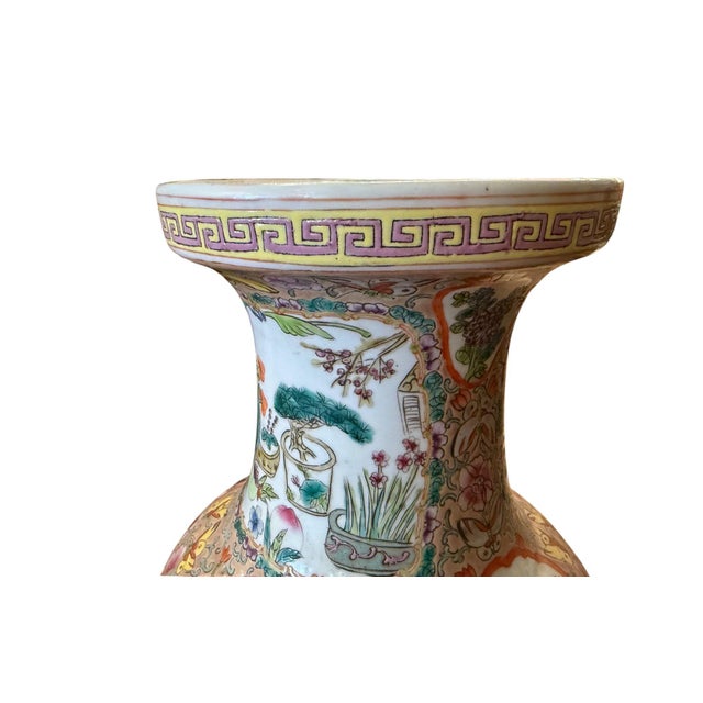 An impressive large Chinese Export Rose Medallion porcelain vase, richly hand-painted with the vibrant palette and...